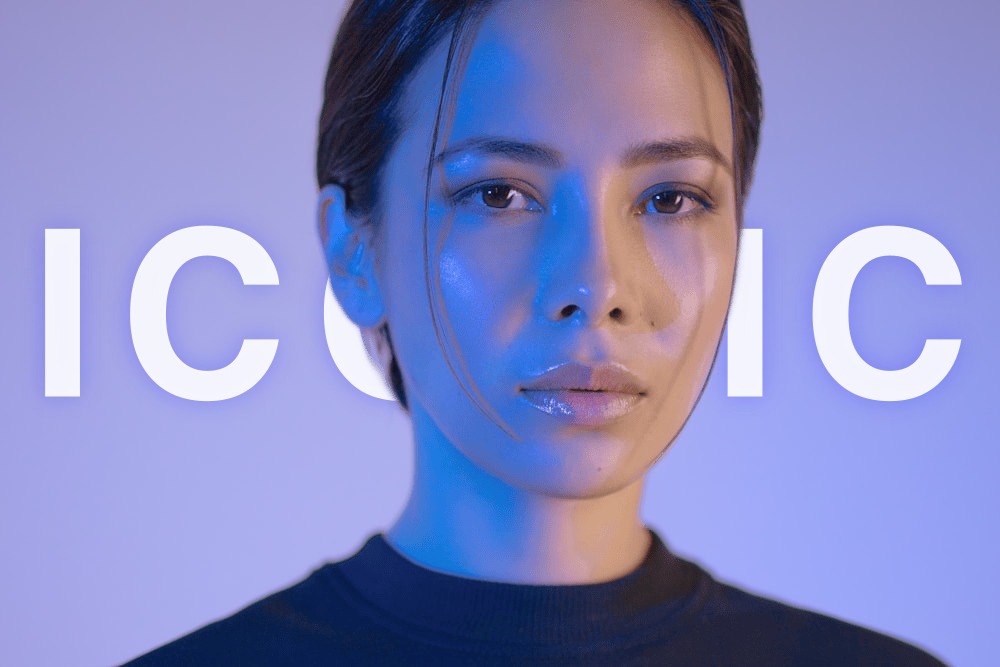 Portrait with ICONIC text placed behind the subject