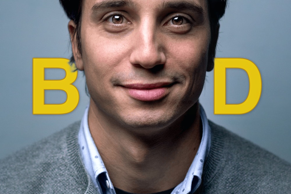 Man portrait with BOLD gold text behind the person